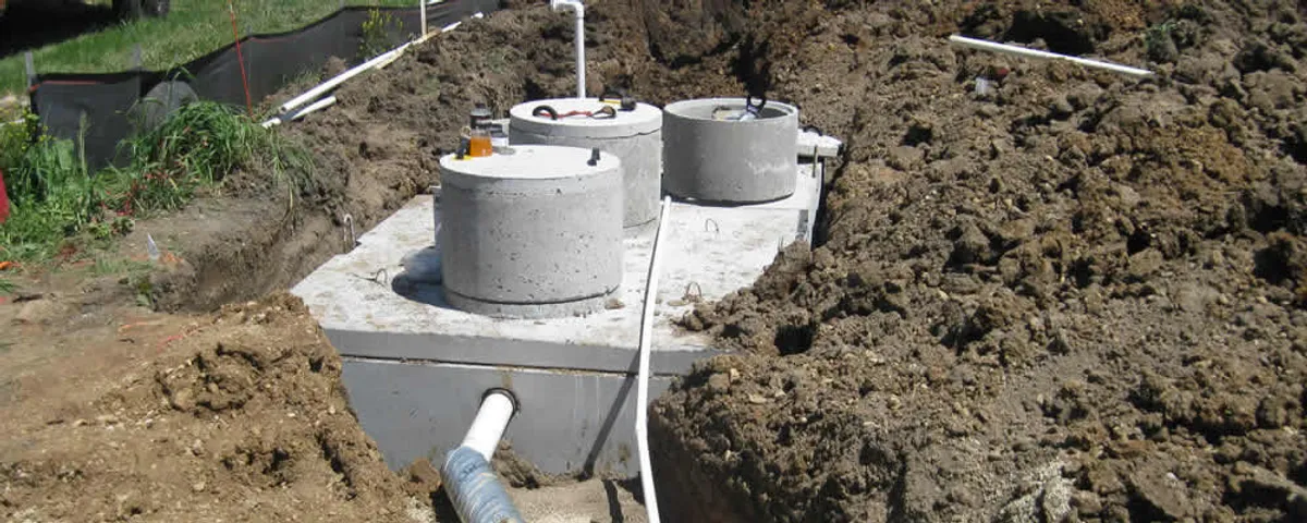 Septic system repair and installation site with tank access ports in Sacramento, CA